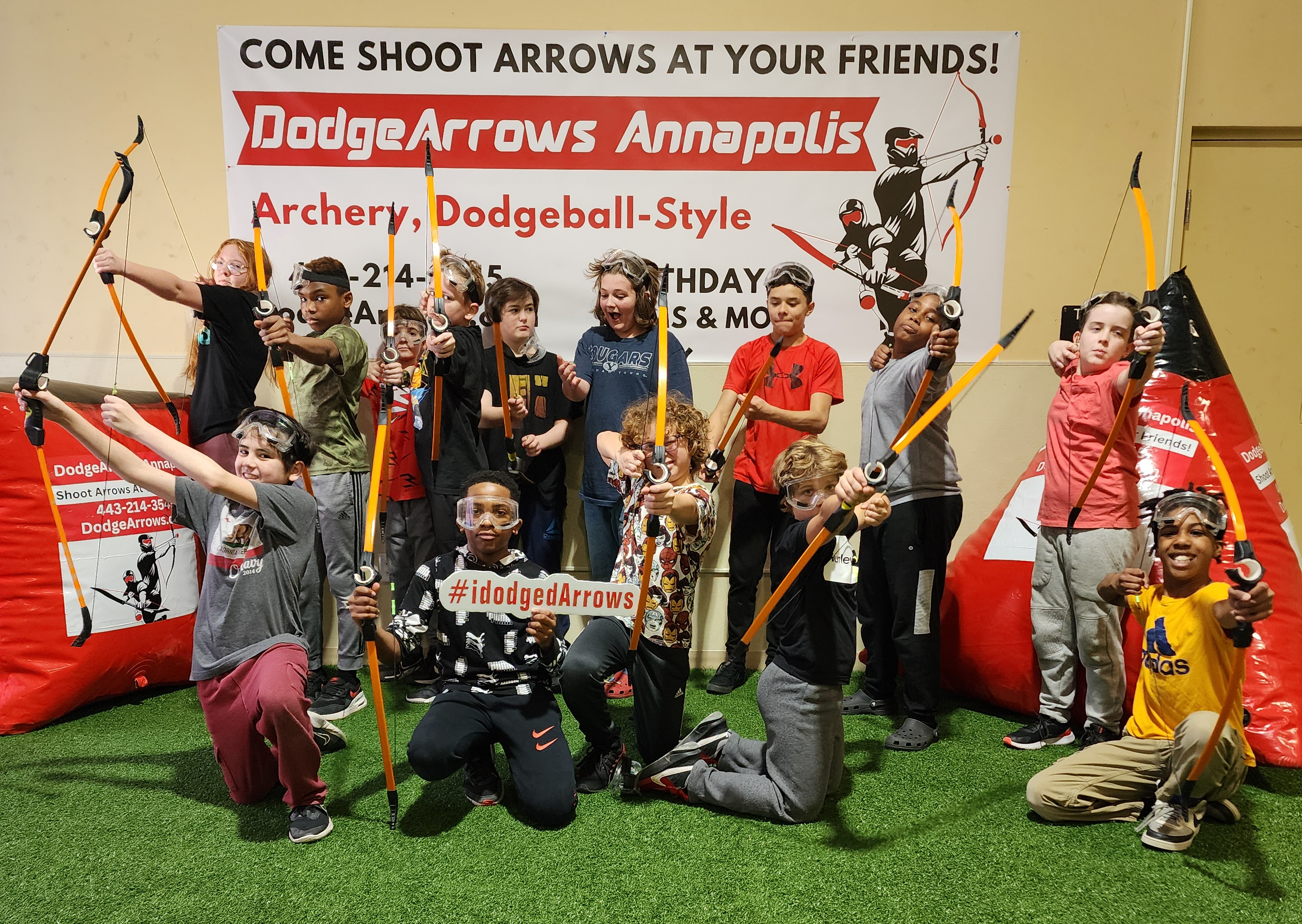 Group of kids playing dodge arrow instead of dodgeball