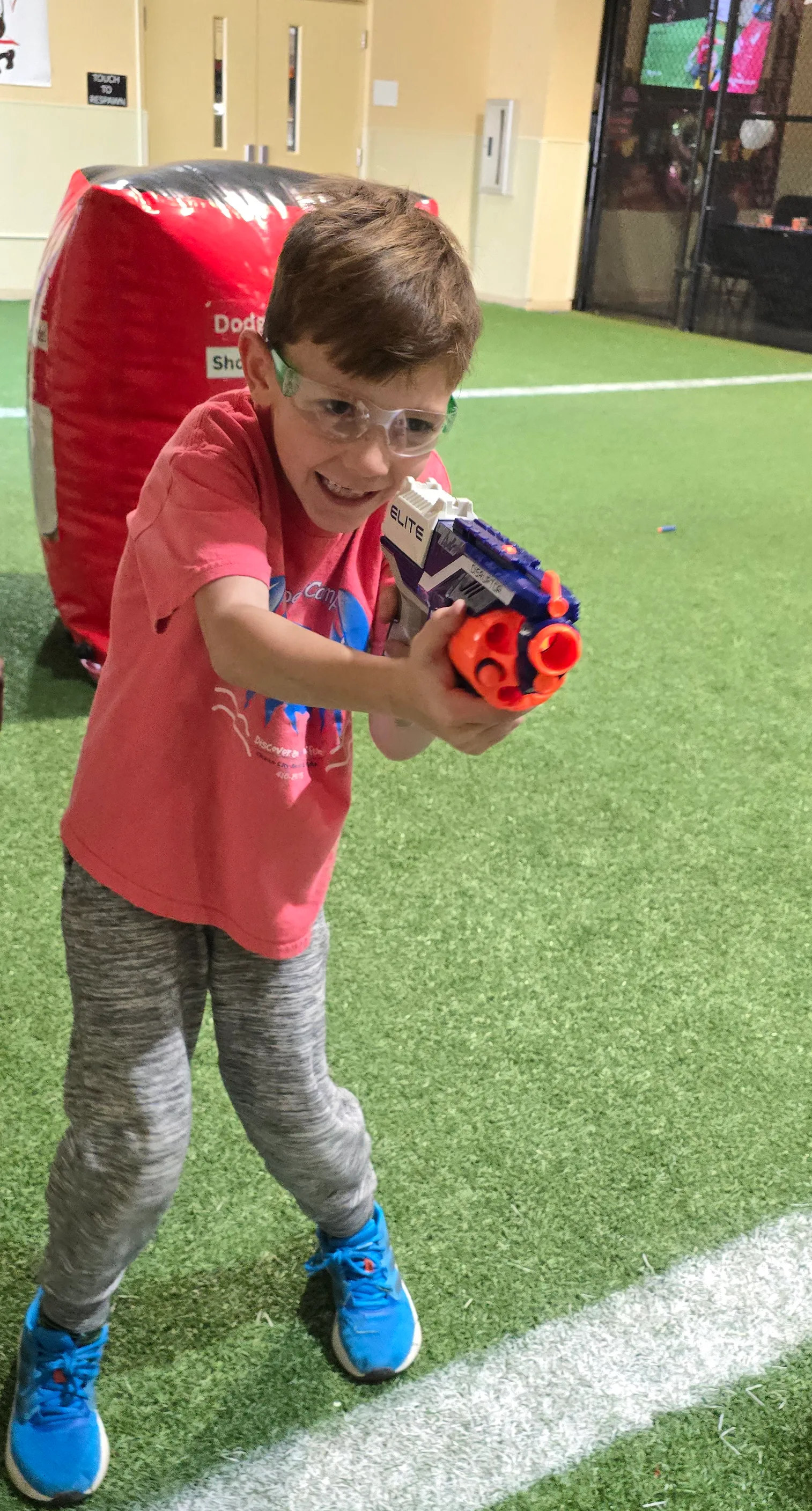 Kids playing Nerf gun war at DodgeArrows indoor arena
